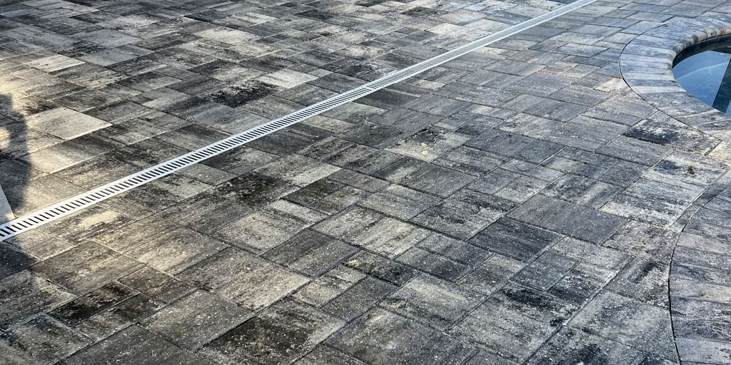 Pavers finished with a wet look paving sealer