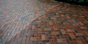 Decorative concrete sealer applied to a finished surface