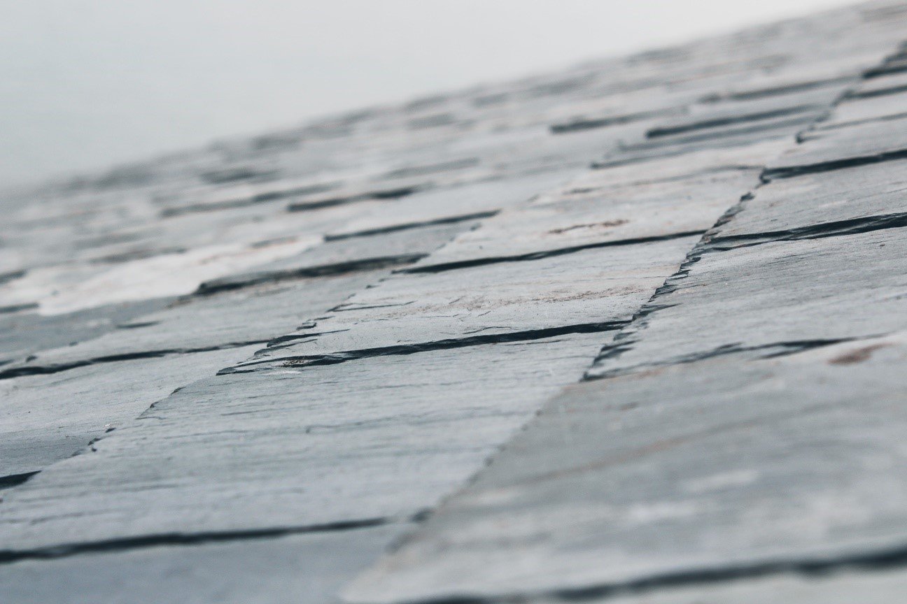 Close-up of stacked thin slate roofing tiles