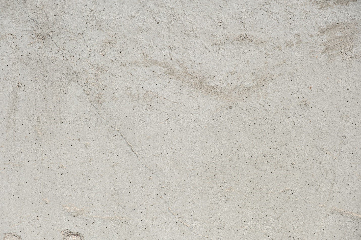 Close-up of a plain cream concrete surface