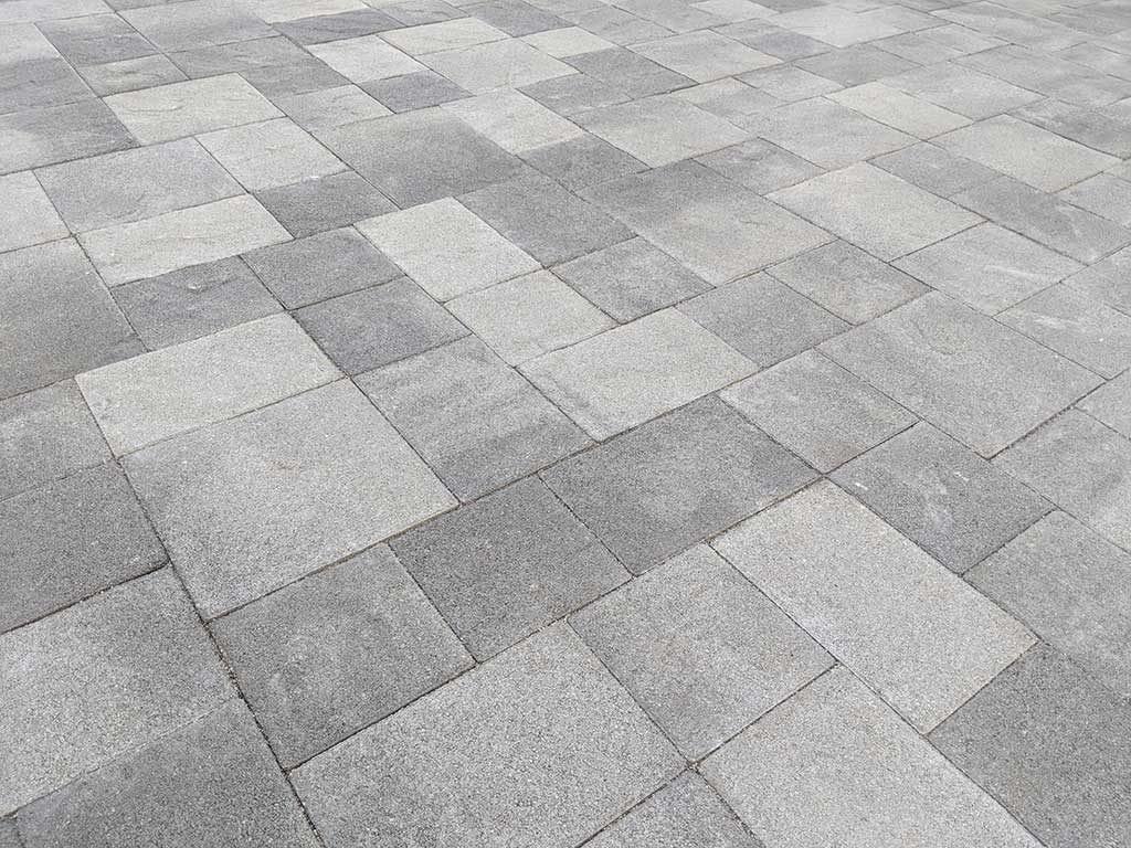 Light grey concrete pavers in a running bond pattern