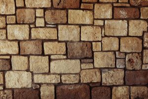 Close-up of tan stacked stone veneer walling