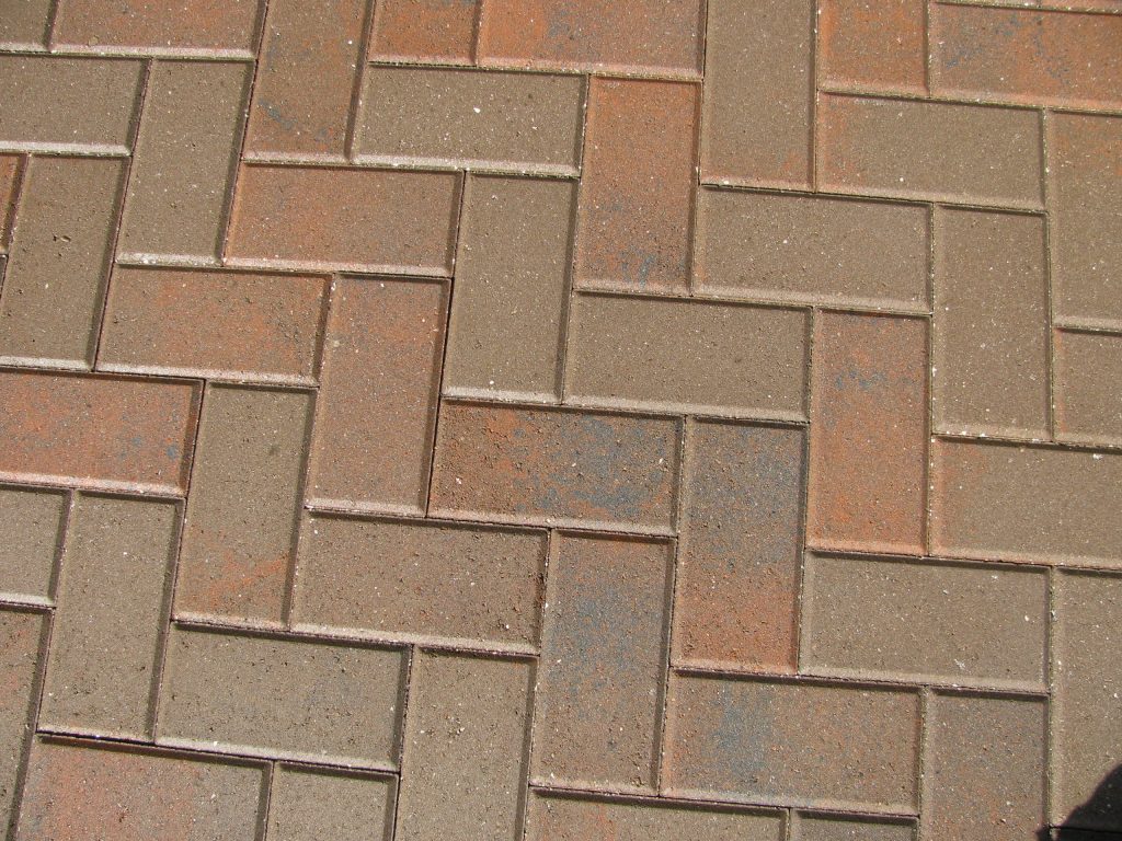 Tan herringbone pavers after cleaning, colour clean and even
