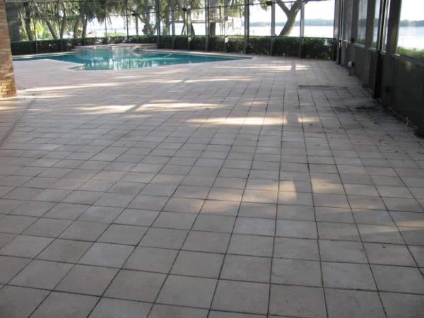 Large screened pool deck, grey and weathered